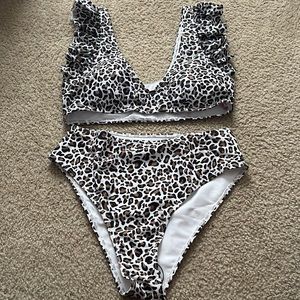 Never worn high waisted/high cut boutique bikini (from the Pink Lily Boutique)